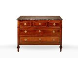 an antique chest of drawers with marble top