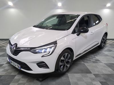 the white car is parked on a checkered tile floor