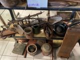 a lot of old tools on a shelf in a store