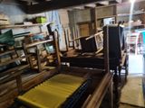 a room filled with lots of different types of furniture