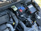 the engine of a car with its hood open and the hood open