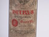 a bottle of wine that is sitting on a table