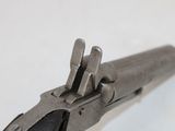 a close up of a pair of pliers on a white surface