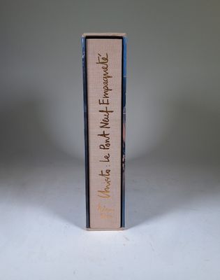 a book with writing on it sitting on a table