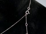 a close up of a necklace on a mannequin mannequin mannequin mannequin mannequin mannequin mannequin mannequin
