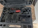 a tool in the case that is sitting on the floor