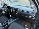 a picture of a car dashboard with a steering wheel