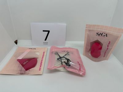 two bags of scissors on a table next to each other