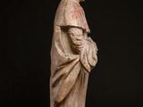 a statue of a woman holding a baby in her arms