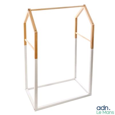a picture of a clothes rack made out of wood and metal
