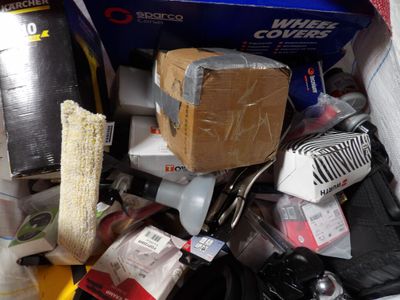 a pile of assorted items in a trash can