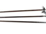 three different types of knives are shown on a white surface