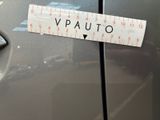 a sticker that says vauto on the side of a car