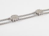 pair of diamond bracelets on a white background with a white background