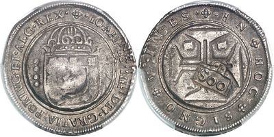 a close up of a coin with a crown on it