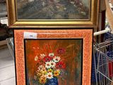 un tableau représentant des fleurs dans un vase bleu posé sur une table rouge
