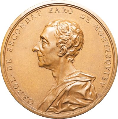 l'image d'une pièce d'or sur laquelle figure le portrait d'un homme