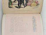 an open book with a picture of a man and a woman on it