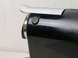 a close up of a coffee machine on a table