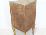 a small wooden cabinet with a drawer on it