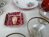 a white table topped with dishes and cups and saucers