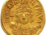 une pièce d'or à l'effigie d'un homme portant un turban