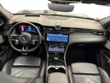 a picture of the interior of a car with a steering wheel and dashboard