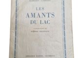 an old book with a blue border on top of it