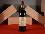 a bottle of wine that is sitting on a table