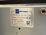 a label on the back of a machine that says mottura