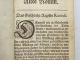 an old book with a black and white image of a snake
