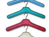 a set of five leather hangers with studding and rivets