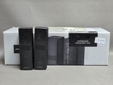 two speakers that are sitting in a box