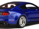 a close up of a blue mustang car on a white background