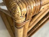 a glass table with a wooden frame on top of it