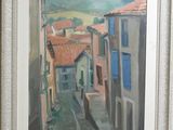 tableau représentant une rue étroite avec des bâtiments et une montagne en arrière-plan