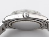 an image of a close up of a watch on a white surface