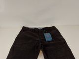 a close up of a pair of black shorts on a white surface