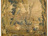 an image of a tapestry hanging on the wall of a room