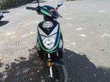 a motorcycle that is parked on the side of the street