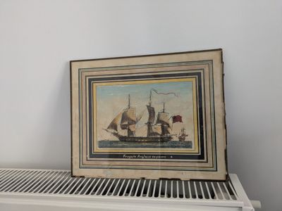 a picture of a painting on a radiator next to a radiator