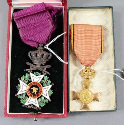 a small box with a medal and a medal on it