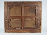 an old wooden window with a rope hanging from it ' s side