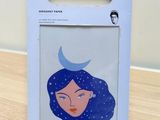 a box with a picture of a woman ' s face on it