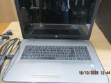 a laptop computer that is sitting on a table