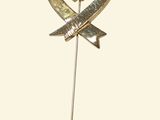 gold heart lapel pin with a bow and arrow on a white background