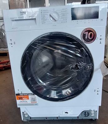 une photo d'une machine à laver dans un entrepôt