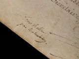 a close up of a piece of paper with writing on it