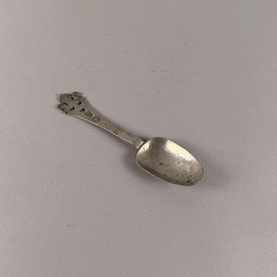 a spoon that is sitting on a table
