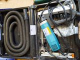 a box with a hose and a blow dryer in it